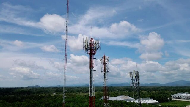 Aerial drone view of tower antennas Telecommunication cell phone, radio transmitters of cellular 4G 5G 6G mobile technology