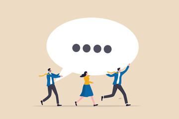 Team discussion, community or social feedback, communication or announcement dialog, team meeting concept, businessman and businesswoman team members help carrying big speech bubble with copy space.