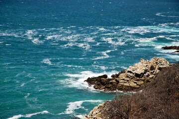 waves crashing on rocks