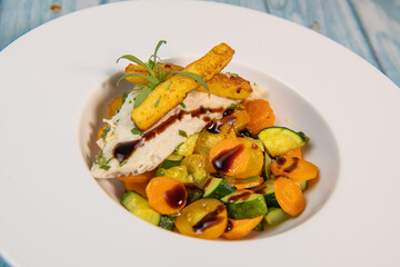 Fish recipe, fillet of sea bass with small vegetables, High quality photo