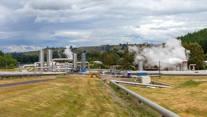 Geothermal power plant steaming, green energy