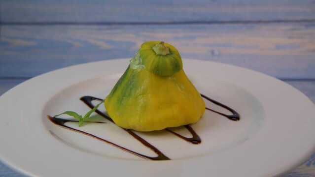 Recipe for mini patissons stuffed with mozarella, basil, tomato and balsamic vinegar on turntable, High quality photo