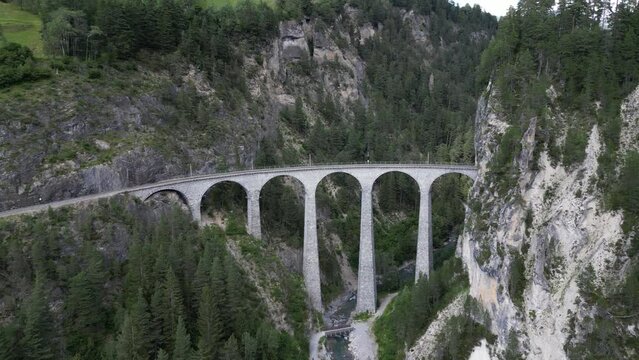 The famous Landwasser Viaduct in Switzerland Grisons. One of the landmarks of Switzerland and the railroads Bernina Express and Glacier Express.