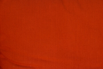 Red wrinkled fabric texture for background