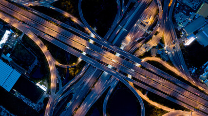 Aerial drone photo of ring road   multilevel circular junction road, road junction. Aerial view of the transportation, traffic, route road and expressway  in the city in Thailand.