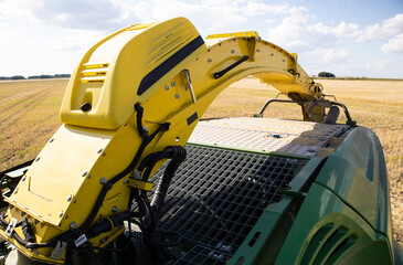 Agricultural machinery in operation in the fields. A new trend in technology.
