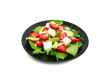 Plate of salad with strawberry isolated on white background