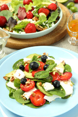 Concept of tasty food, salad with strawberry