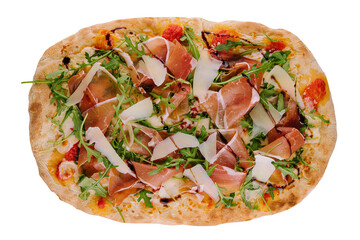Fresh pizza Parma made of parmesan, prosciutto ham and arugula