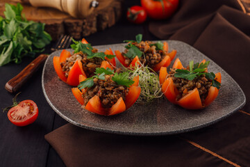 Tasty red stuffed tomatoes with rice and minced meat