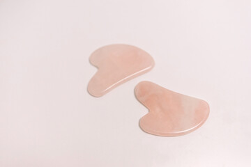 Gua sha tool.
Beauty and skincare concept. Massage for facial lifting