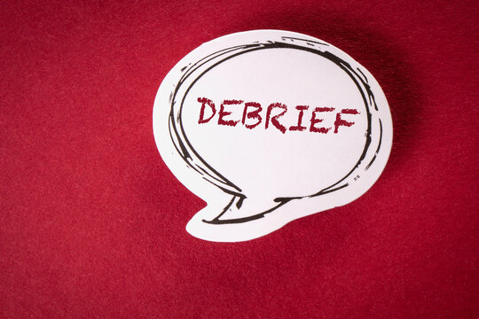 DEBRIEF. Text on speech bubble and red background
