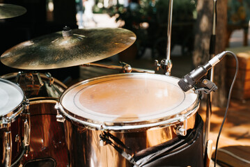 Close-up of a drum set at a street music festival. Snare drum and microphone, selective focus