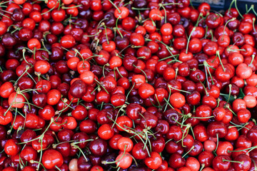 Top view of red cherries in a shop