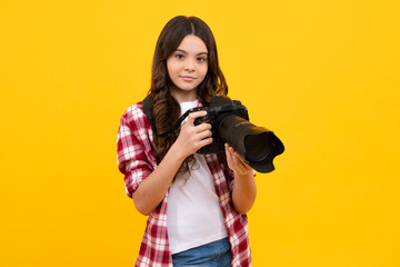 Obraz premium Hobby or career for photographer beginner. Teenage girl with modern camera making video and photo. Kid use digital camera, photographing.