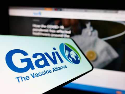 Stuttgart, Germany - 07-31-2022: Mobile phone with logo of health partnership Gavi, the Vaccine Alliance on screen in front of website. Focus on center of phone display.