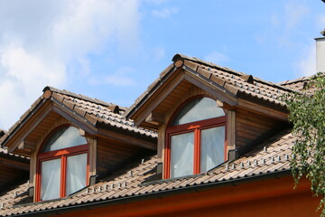 Red tiled roof on a residential building.