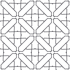 Monochrome seamless pattern with ethnic geometric ornament.