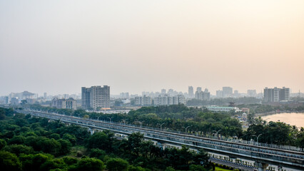 Fototapeta na wymiar Indian cityscape aerial view with buildings roads and over bridge of Kolkata