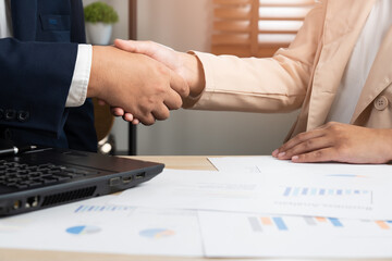 Business man and woman do handshaking agreement contact success