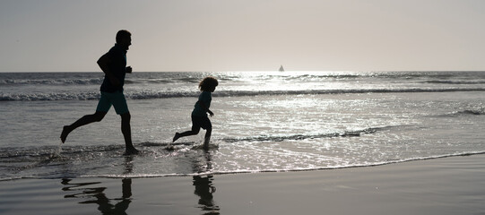 Silhouette of father and son run on summer beach outdoor, banner poster with copy space, dad and child silhouettes running having fun and feel freedom on summer beach, family