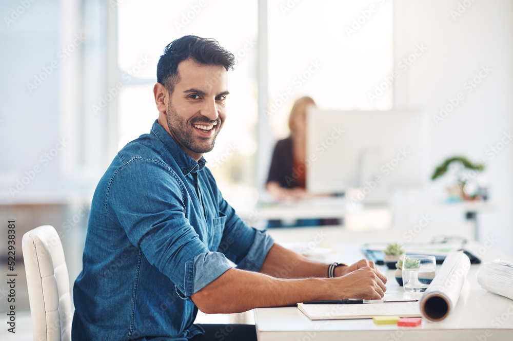 Aufkleber happy creative businessman working at his desk, doing admin and taking notes while in an office at w