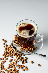 cup of coffee top view on gray background, whole grain coffee, latte or cappuccino on milk, with copy space 