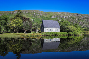 Gougane Barra is a scenic valley and heritage site in the Shehy Mountains of County Cork, Ireland. It is at the source of the River Lee and includes a lake with an oratory built on a small island.