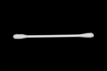 White cotton swabs isolated on black background