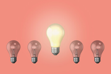 lightbulb light bulb moment idea imagination concept inspiration concept lit glowing old style light bulbs lightbulbs pink background