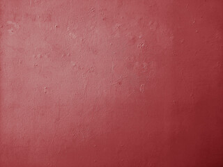 ワインレッドに塗られたコンクリートの古い壁