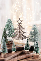 Christmas tree on bohek wooden, bokeh background.