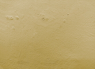 アースカラーにペイントされたコンクリートの壁