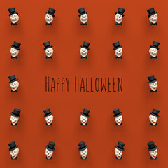 Happy Halloween pattern featuring skulls with top hats and bow ties on orange background with Happy Halloween message. Minimal holiday style.
