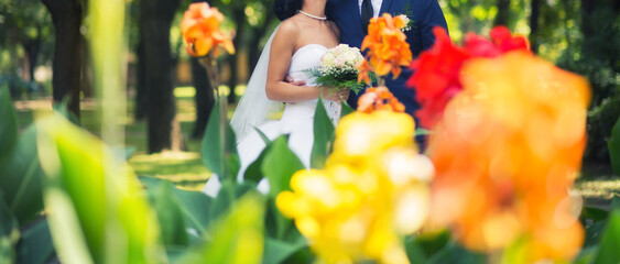 Bride and groom during wedding on a sunny summer day