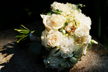 Beautiful tender wedding bouquet and rings.