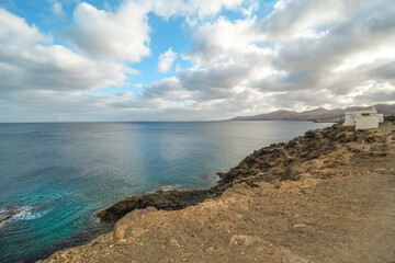 Fototapeta na wymiar View of the Ajaches from Puerto del Carmen in Lanzarote