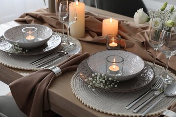 Festive table setting with beautiful floral decor in restaurant