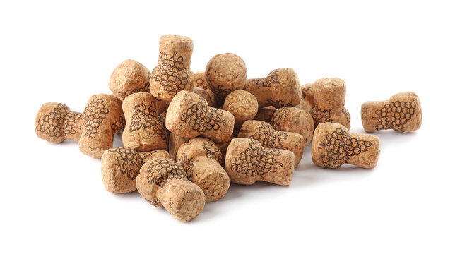 Heap of sparkling wine corks on white background