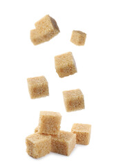 Flying cubes of brown sugar on white background