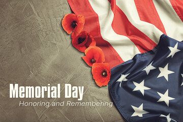 Memorial Day, Honoring and Remembering. American flag and red poppy flowers on grey background, top...