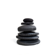 Fototapeta na wymiar Stacked black stones. Balancing pebbles isolated on white background