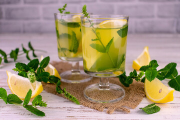 Lemon drink with mint. Limoncello lemon liqueur.
