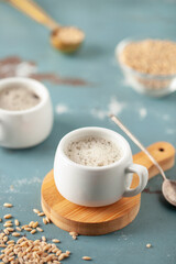 Cup with coffee barley with barley grains. Healthy herbal drink for immunity. Coffee alternatives
