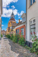 Bell Tower and the old narrow streets in faaborg city, Denmark