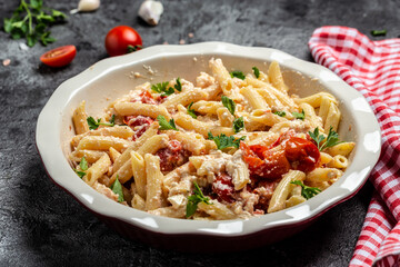 baked feta pasta with cherry tomatoes herbs and garlic, Trending Fetapasta. banner, menu recipe place for text, top view