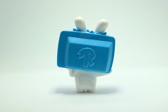 Rabbids invasion. Cartoon. Videogame. Mysterious race of rabbit-like creatures that have come from another planet. Toy. Isolated white. TV. Television. View from behind
