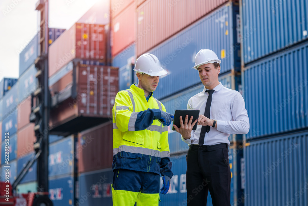 Poster Engineer and inspector working and discuss in shipping container in Container Terminal.