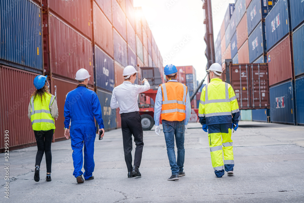 Aufkleber Technicians or engineer with worker walking and discuss together about work in cargo container workplace area,logistic and business export.