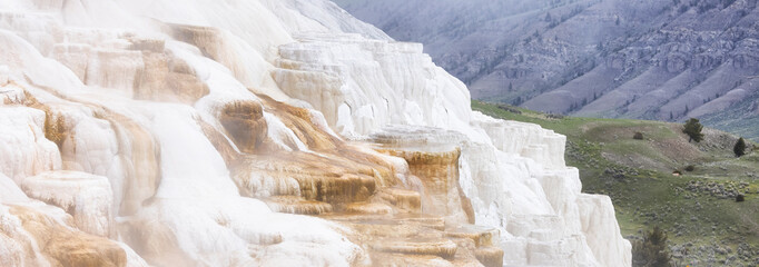 Hot Spring Landscape with colorful ground formation. Mammoth Hot Springs, Yellowstone National Park, Wyoming, United States. Nature Background.